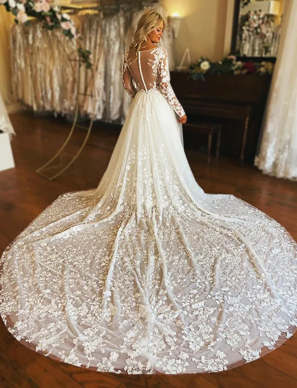 Robe de mariée ivoire à col en V et manches longues en tulle et dentelle