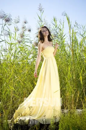 Robe de soirée bustier jaune en mousseline ornée de bijoux