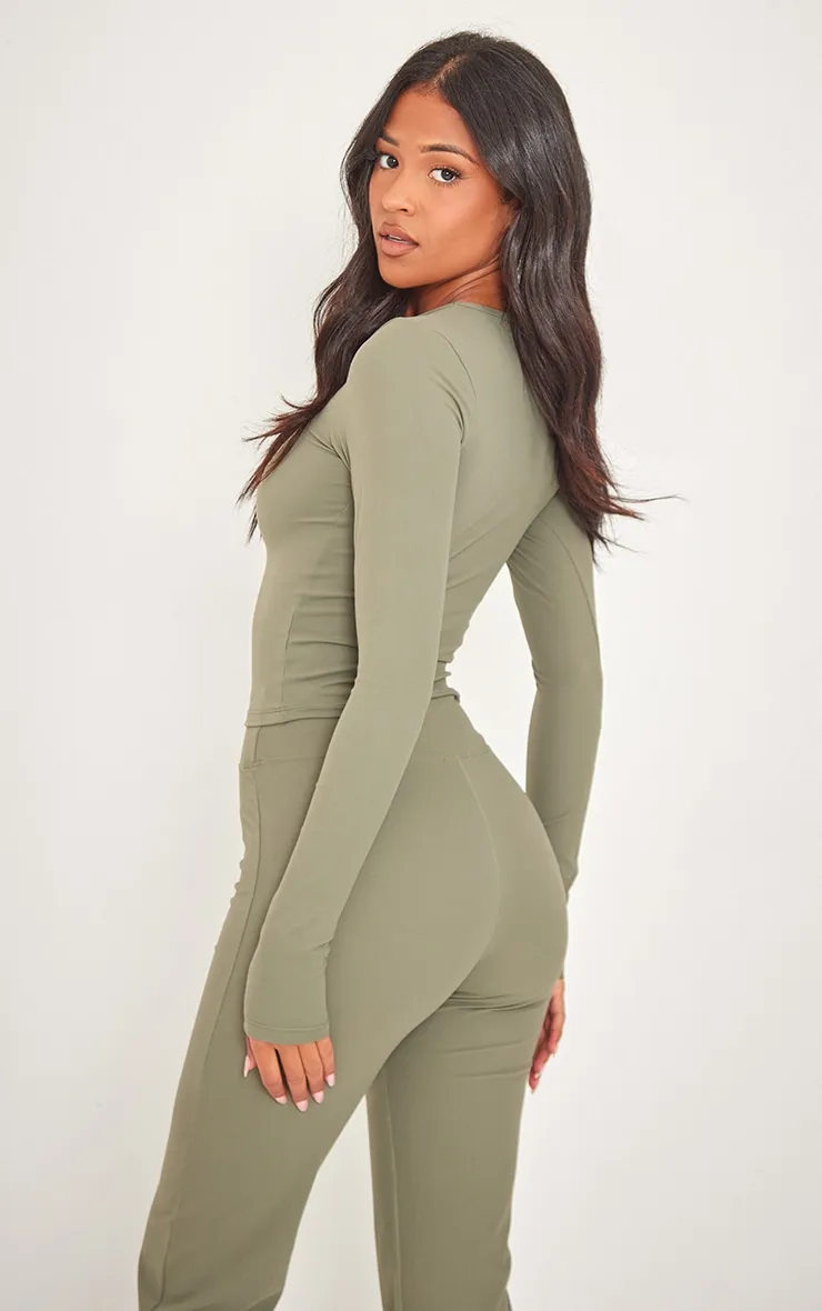 Tall Top contour sculpt vert olive froncé à manches longues