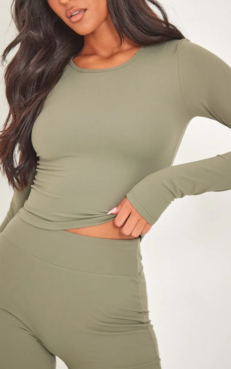 Tall Top contour sculpt vert olive froncé à manches longues